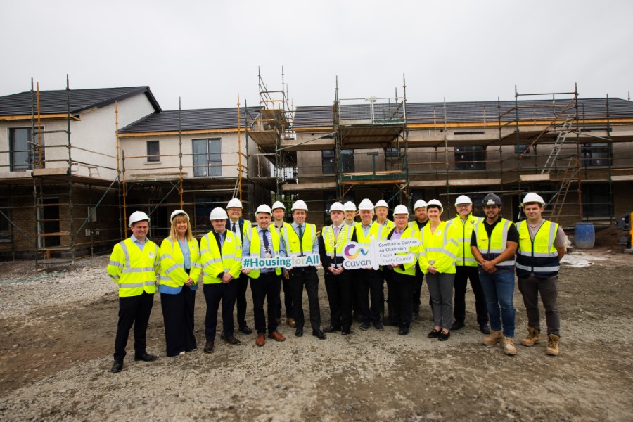PHOTO: Pictured surveying progress at the Plás na hEithne housing development at Derrylurgan, Ballyjamesduff are (from left) Cormac Fitzpatrick, Cavan County Council; Director of Service, Lynda McGavigan; Cllr Noel Connell; Chief Executive of Cavan County Council Eoin Doyle; Cllr Trevor Smith; Declan Tierney, Cavan County Council; Minister of State John Cummins; Cathaoirleach of Cavan County Council, Cllr John Paul Feeley; Tom Carty, Cavan County Council; Senator Joe O’Reilly; Tony Naughton, Clerk of Works; Deputy Brendan Smith; Tyrone Farrelly, Crosserlough Construction; Senator Pauline Tully; Senior Engineer, Housing Construction, John Wilson; Niall McGaughran, Crosserlough Construction; Colm McNally, Crosserlough Construction. PHOTO: Sheila Rooney.