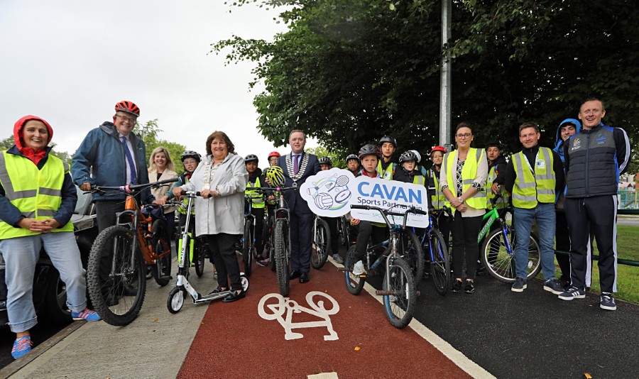 Eoin Doyle, Chief Executive Cavan County Council, Cllr Patricia Walsh, Vice-Chair Cavan/Belturbet Municipal District and Cathaoirleach John Paul Feeley alongside staff of Cavan County Council & Cavan Sports Partnership with the children from St Felim's National School, Cavan Town as they prepare to start their  Scoot to School  on Friday morning.  The route took the students from Cavan Institute to St. Felim’s School, via the new cycling lanes and upgraded footpaths installed by Cavan County Council