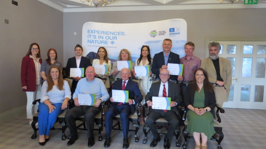 Caption: Pictured at the certificate presentation ceremony for the 2024 Business Sustainability Training Programme Caption are: (back row l to r): Tina O’Dwyer, The Tourism Space; Clarissa Beacom, Cuilcagh Lakelands Geopark; Leo Nacer, Fermanagh Lakeland Tourism; Pauline Carey, Lough Erne Resort; Regina Canning, Farnham Estate; Lisa McWilliams, Keenaghan Cottage; Terry McCartney, Belmore Court & Motel; Councillor Anthony Feely, Chair, Geopark Committee; Ian Davidson, Fermanagh and Omagh District Council. (front row, l to r) Karan McLernon, Cuilcagh Lakelands Geopark; Tony McGovern Swanlinbar Community Association and Trivia House, Tony Walker, Slieve Russell Hotel; Des Gamble, Drumrush B&B; Gráinne O’Connor, Cuilcagh Lakelands Geopark